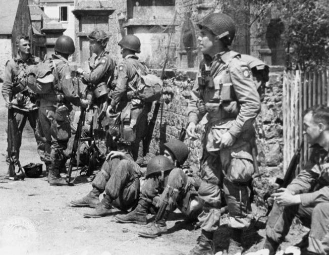 Paratroopers of the 82nd Airborne Division take a break during the fighting in Normandy. Nobles and his comrades fought for six straight days in the hedgerows.