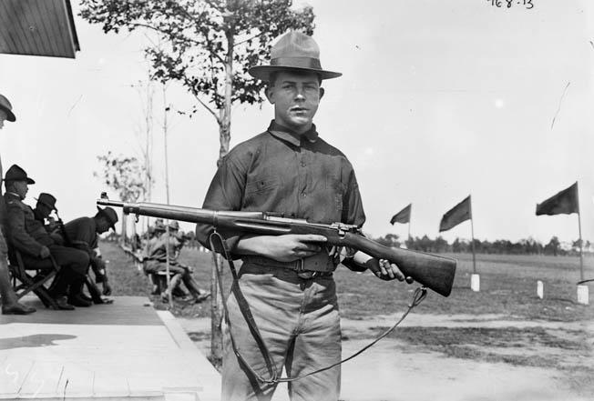 A U.S. soldier poses proudly with his new Springfield in this early, undated photo.
