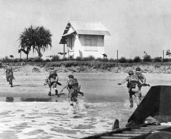 In this photo taken during the progress of the campaign to secure Madagascar from Vichy French forces, British Commonwealth soldiers rush ashore on the large island in the autumn of 1942. The fight for control of Madagascar was sharp and costly as the British sought to secure it from possible Japanese occupation.