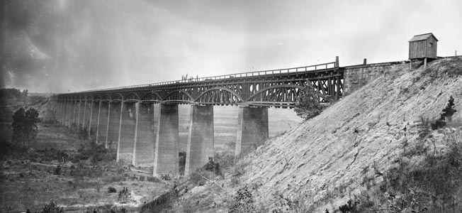 Quick-thinking troops of the 19th Maine Infantry arrived just in time to prevent Confederates from burning strategically invaluable High Bridge at Farmville, seen here in a photograph from 1865.