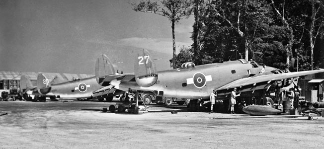 RNZAF ground personnel service Lockheed Ventura PV1 medium bombers on Green Island in the Solomons, December 1944. The versatile PV1 replaced the Lockheed Hudson.