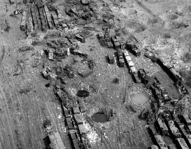 Railyard near Limburg was rendered unserviceable as part of the tactical air plan to isolate enemy troops from their sources of supply and reinforcement. (2 May 1945)