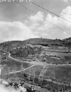 10th Mountain troops ride on tanks through the last line of mountains before descending into the Po River Valley a month before the war ended. The 10th’s specialized training was instrumental in ensuring the division never lost a battle or gave up an inch of ground. 