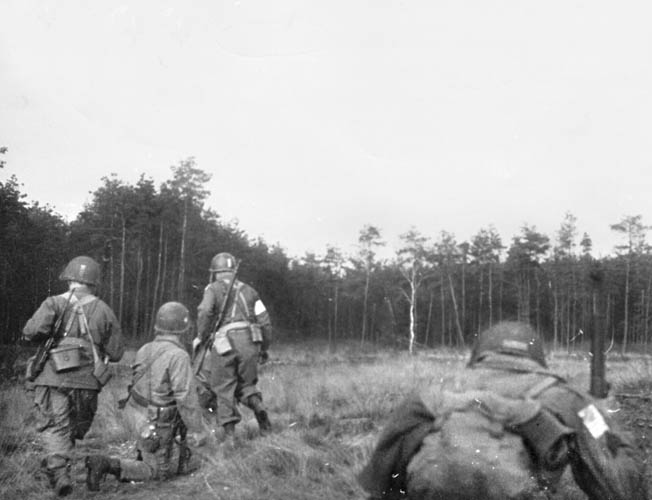 Immediately after landing, men of the 507th PIR, known as “Raff’s Ruffians,” head for their objective, the Diersfordt Castle.