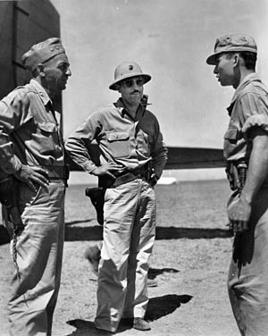 Colonel Lyle Meyer (center), commander of Marine Air Group 24, carried out close-air ground support missions in support of the Army.