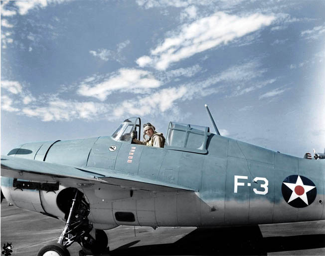 Butch O’Hare gives the “thumbs up” gesture from the cockpit of his Wildcat, April 10, 1942. Note the five Japanese flags painted on his fuselage, symbolic of his first five “kills.” 