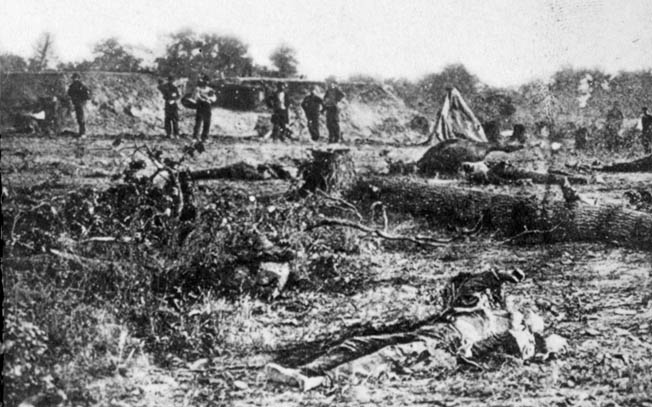 A Confederate corpse lies in Battery Robinette following the Second Battle of Corinth in autumn 1862. The clash showed that Van Dorn had little skill as a commander of infantry forces in large battles.