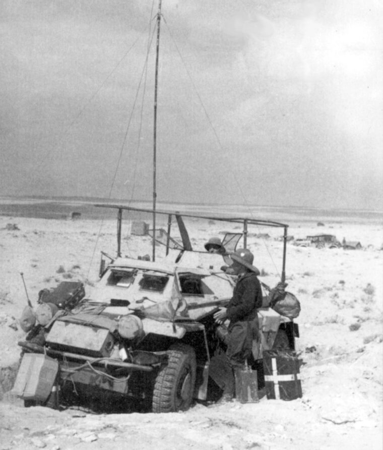An antenna rises out of the scope of this picture of a German desert vehicle that was repositioned to both transmit and gather radio data. Intelligence on enemy position was vital to the fluid desert war. 