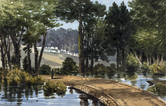 A lone Union sentry guards a temporary wooden bridge built by industrious engineers over the Chickahominy River. Army tents are in the distance.