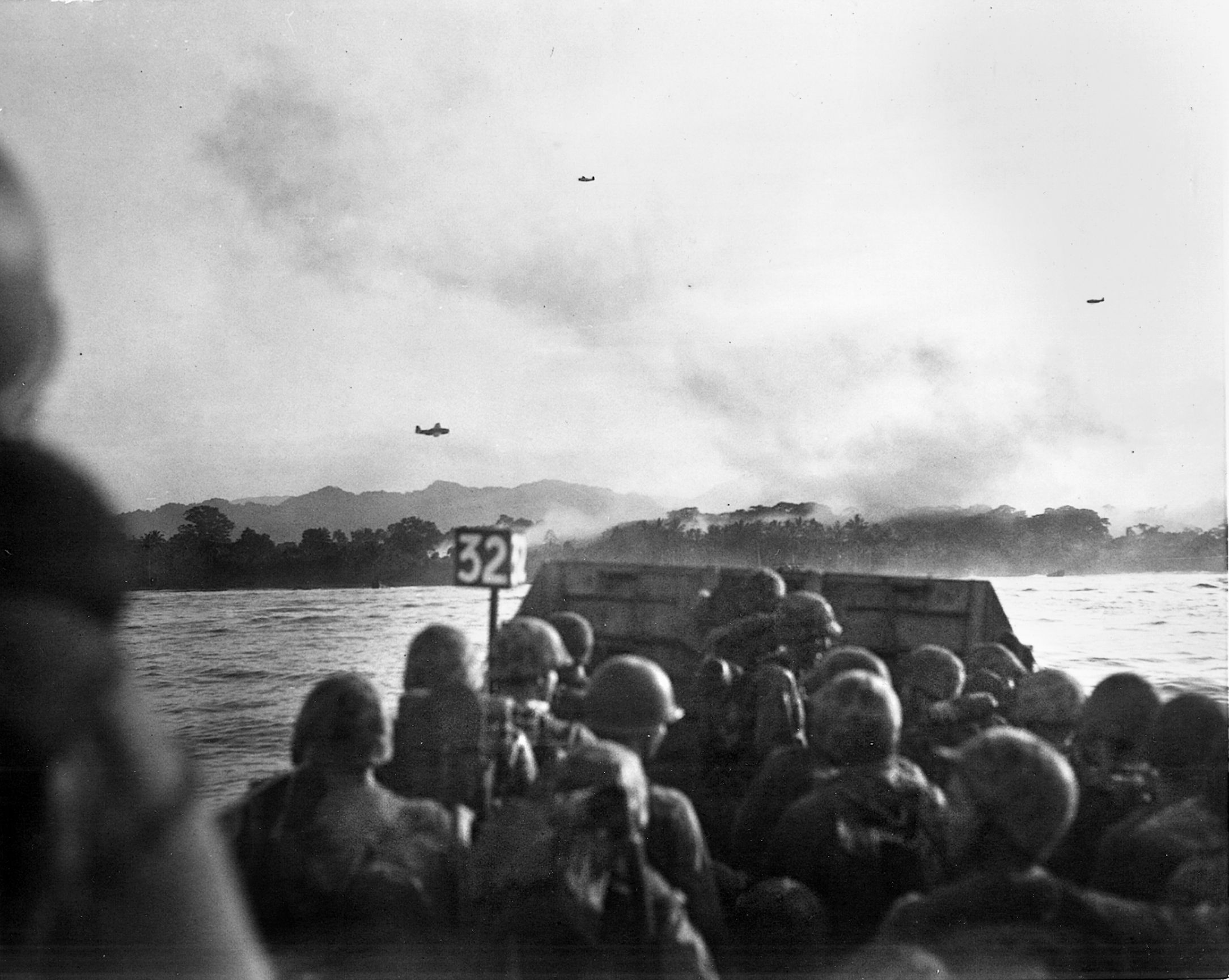 A landing craft carries U.S. troops toward the invasion beach at Cape Gloucester. The great Japanese base at Rabaul was also located on the island, however, U.S. forces did not attempt a direct assault on the fortress.