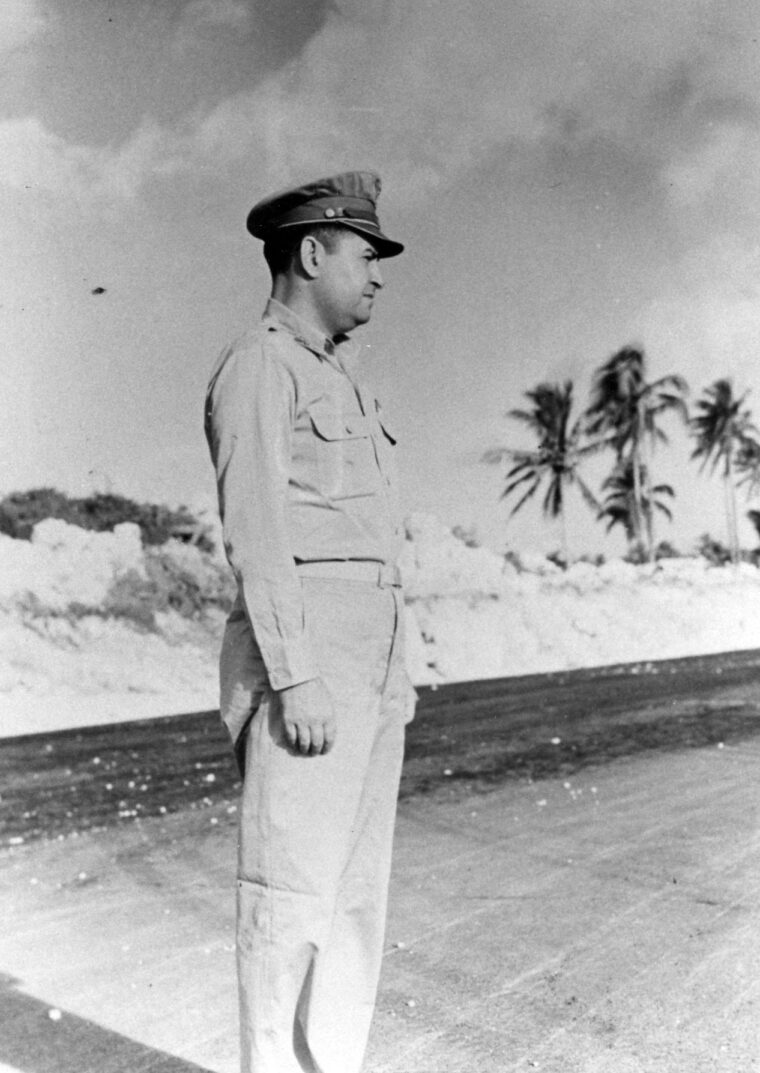 Maj. Gen. Curtis LeMay, head of the 21st Bomber Command, observes Tokyo-bound planes lifting off from Guam.