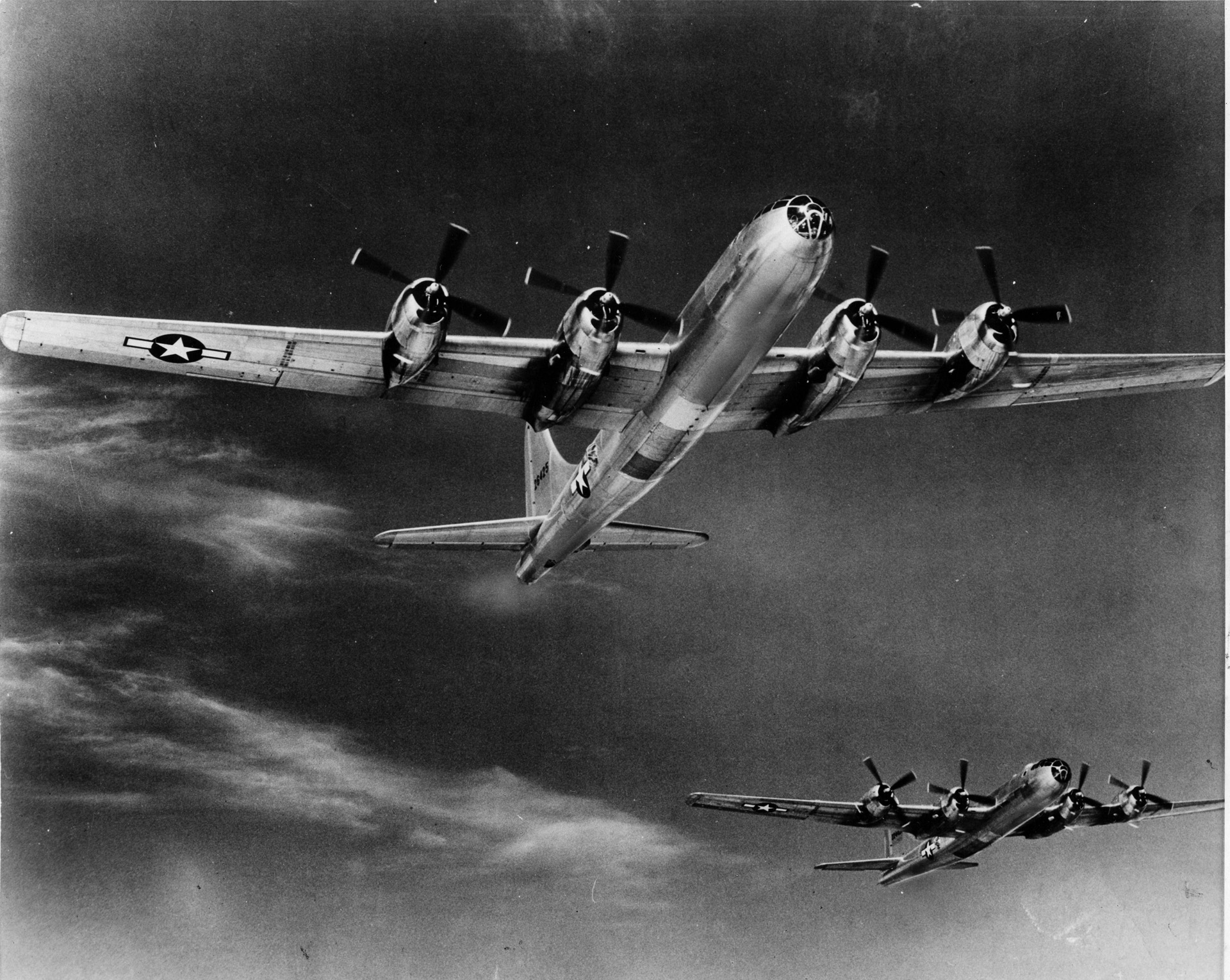 Operation Meetinghouse: Part of an armada of B-29 bombers on their way to bomb Tokyo, March 9-10, 1945.  With over 100,000 people killed, a million left homeless, and nearly 16 square miles of the city reduced to ashes, the raid is considered the single most destructive aerial attack of the war.