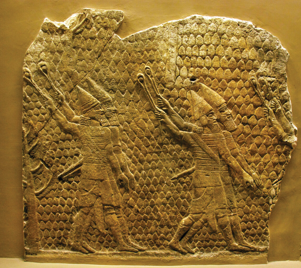 Assyrian slingers shown in action during the siege of the Judean city of Lachish in 701 bc. From a fragment of a wall relief. 