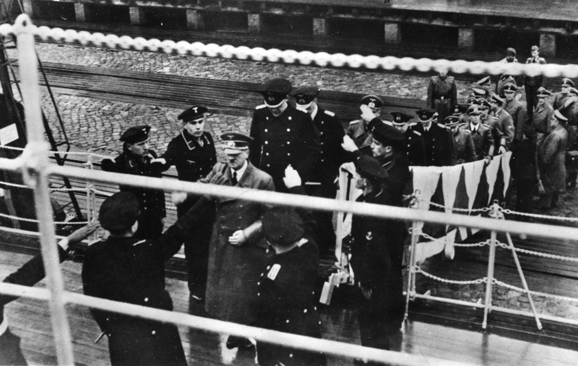 Saluting sailors welcome Hitler aboard the German battleship Tirpitz at Gotenhafen, May 5, 1941. Having no experience with large-scale seaborne invasions, the Germans were unsure how to carry out Operation Sea Lion, the planned invasion of Britain. 
