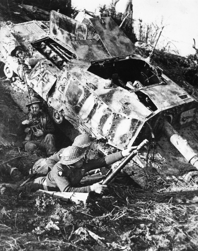 Polish soldiers fire a two-inch gun from a position beside a knocked-out German tank in Italy. In their advance north through Italy along the Adriatic Coast, the Polish 2nd Corps solidified its reputation as one of the best Allied units in Italy.