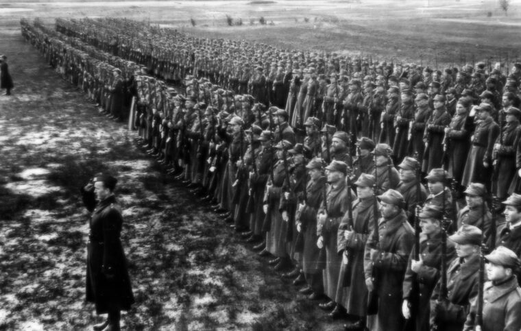 Polish soldiers on parade in the Soviet Union before departure for Iran. Anders resisted repeated efforts by the Soviets to put Polish troops into battle without proper training and equipment.