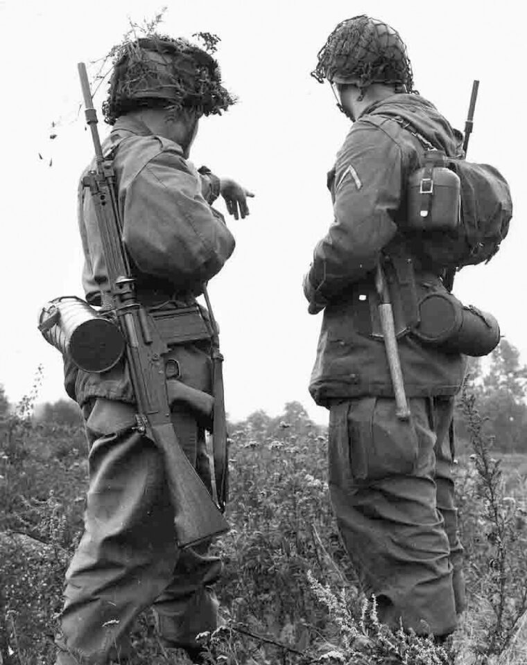 A West German soldier (left) carries the FN-FAL while on a joint exercise with U.S. forces in 1960. West Germany used the rifle, which it called the Gewehr G1, in the late 1950s and early 1960s. 