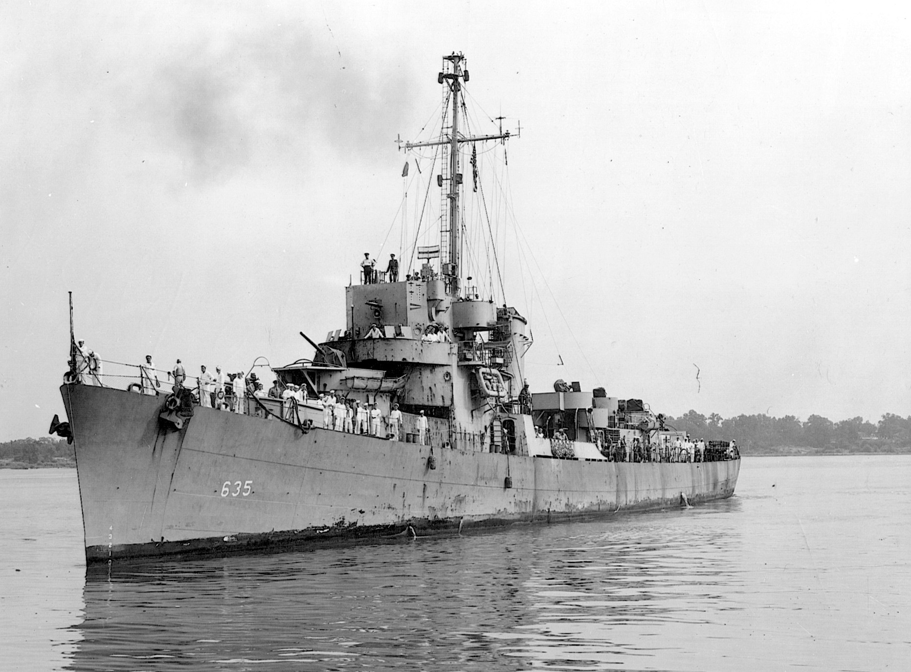 The USS England, sporting painted symbols on her bridge of the six Japanese subs she sank, was awarded the Presidential Unit Citation.