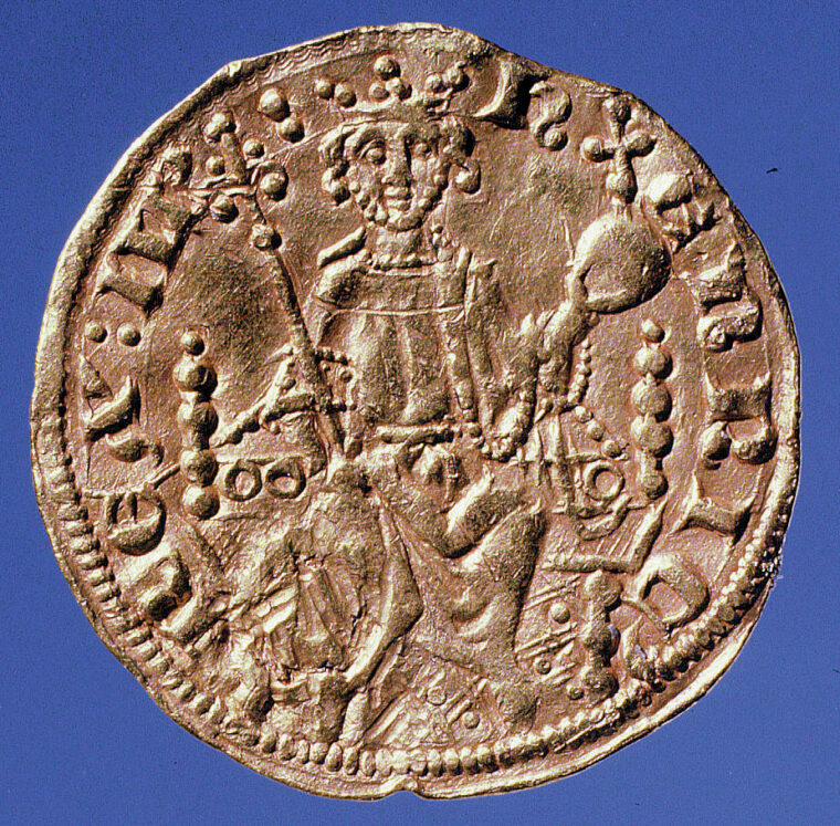  A gold penny bears the image  of Henry III.