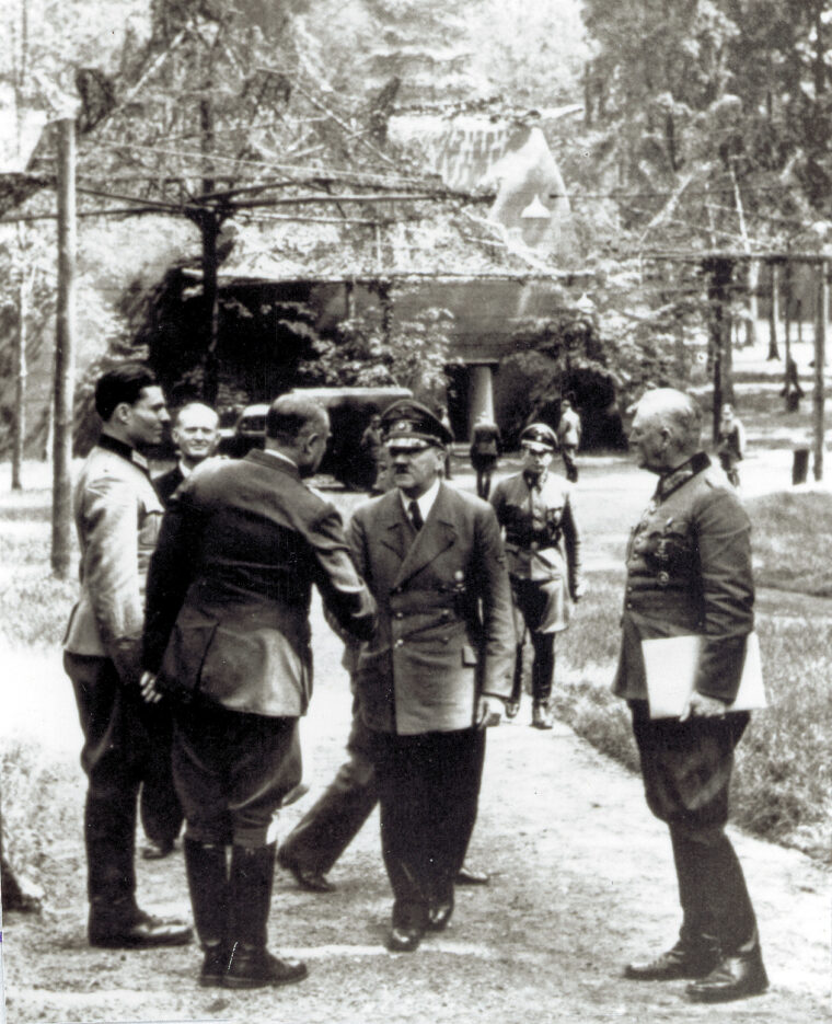 Taken five days before the bomb plot explosion, this is the only known photograph of the would-be assassin Claus Schenck von Stauffenberg  (far left) with Hitler.