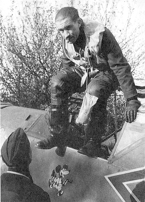 Galland descends from his Me 109. He adopted Mickey Mouse as a logo in 1938 and kept it through WWII.