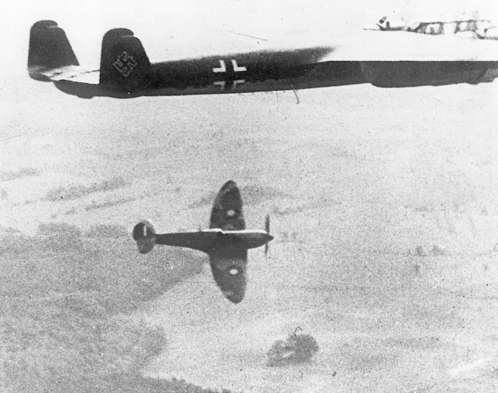 A Spitfire swoops past a Dornier-17 bomber. The Do-17s were nearing obsolescence in the summer of 1940, but the Germans threw them into the fight in hopes of overwhelming the British resistance.