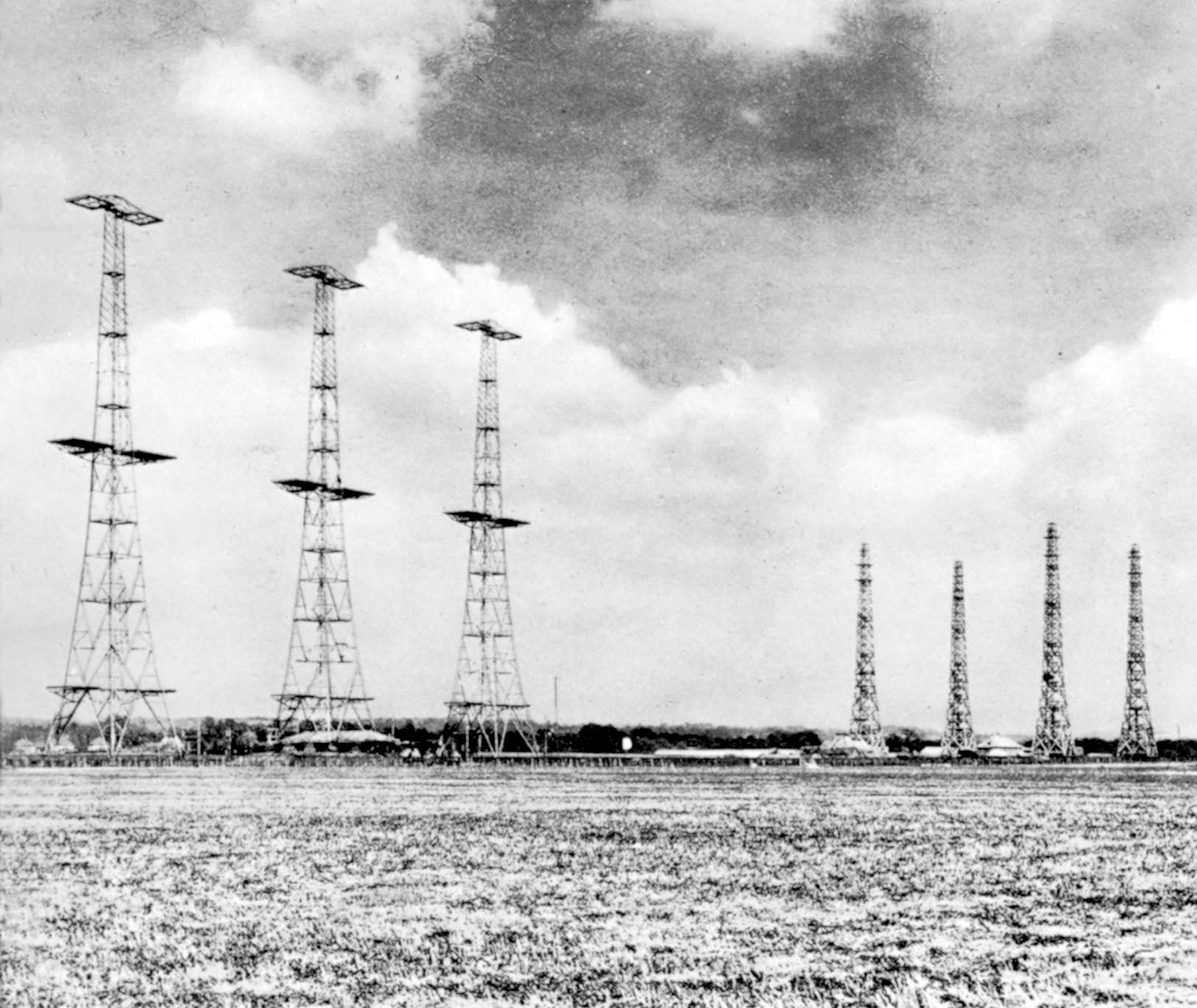 Like ungainly monsters, these radar masts rise to protect Britain. They could detect bombers assembling over France and alert RAF forces.