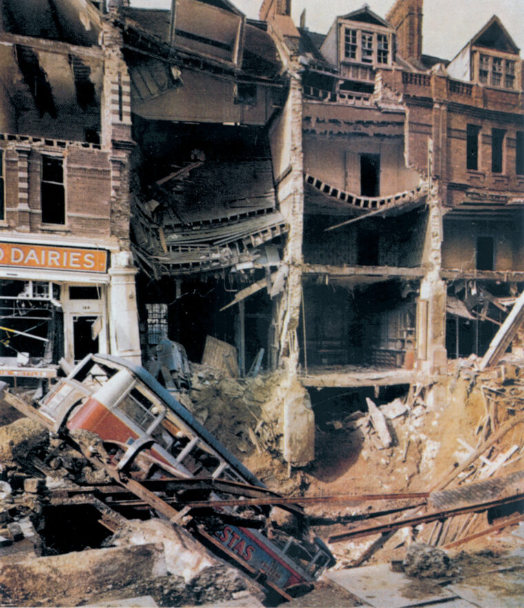 Balham High Street suffered considerable damage in a summer bombing raid. Scenes such as this became common in British cities.