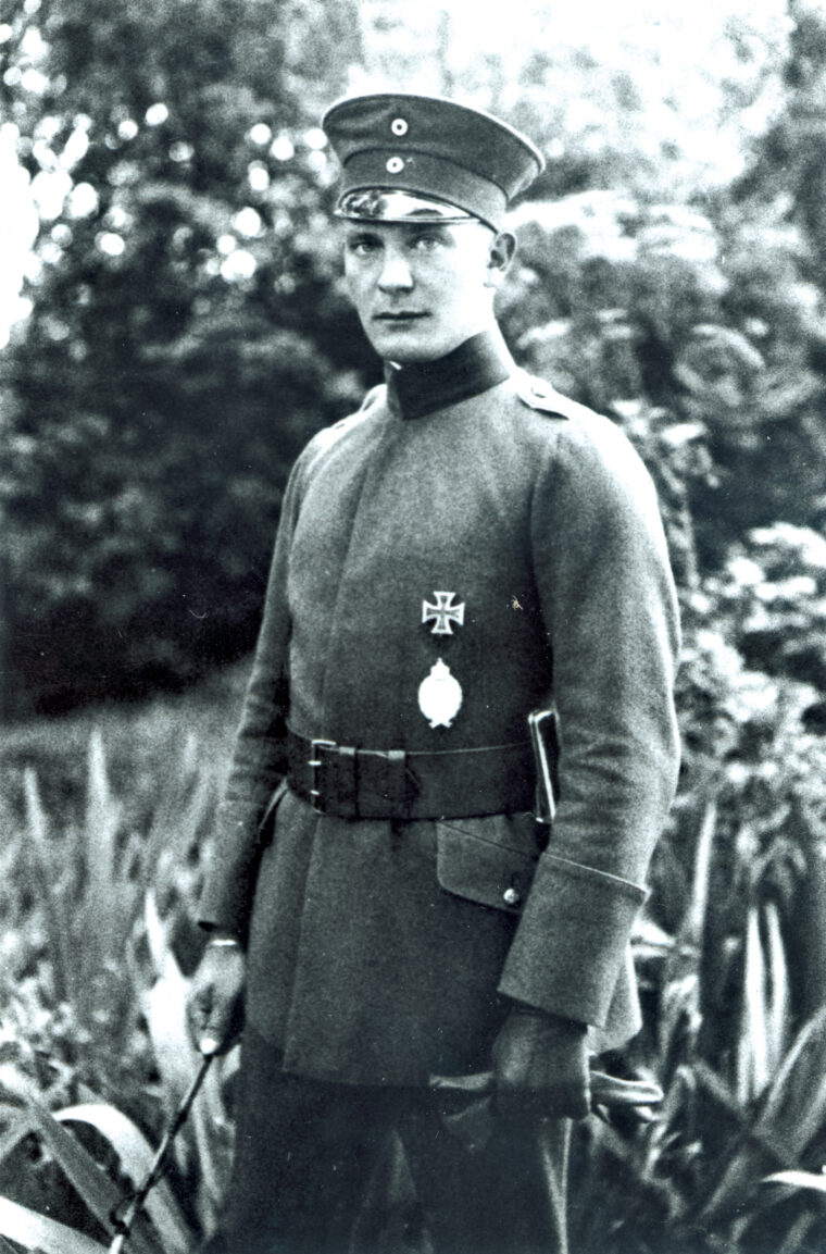 Young World War I ace Göring proudly wears his Iron Cross and Imperial Flying Service Badge.