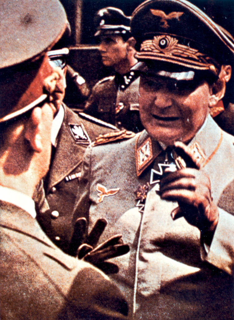 In April 1941, Reich Marshal Göring stresses a point to Chancellor Adolf Hitler at Monichkirchen Station, Austria, during planning for offensive operations in the Balkans.
