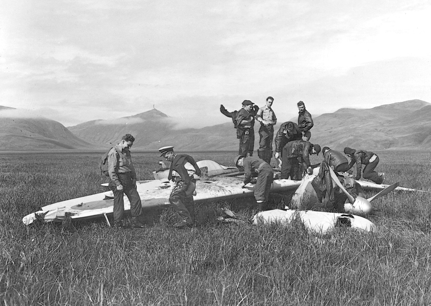 American soldiers inspect a captured Zero that crashed near Broad Bay in the Aleutians on July 10, 1942, but remained largely intact.