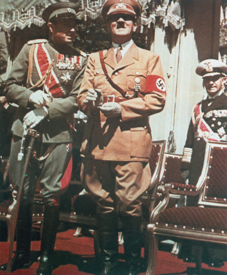 Yugoslavia’s Prince Paul (left) stands with Adolf Hitler during the last great prewar military parade in Berlin, June 1939.