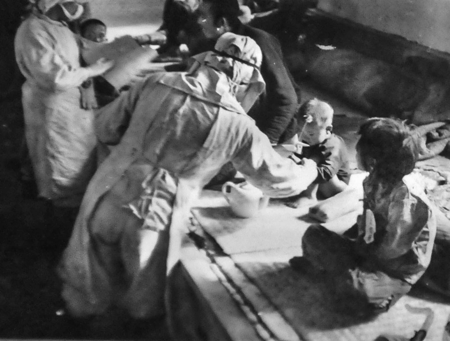 Chinese children are being subjected to trials intended to limit the spread of the plague. Many of the terrible experiments conducted by Unit 731 involved the spread of infectious disease.