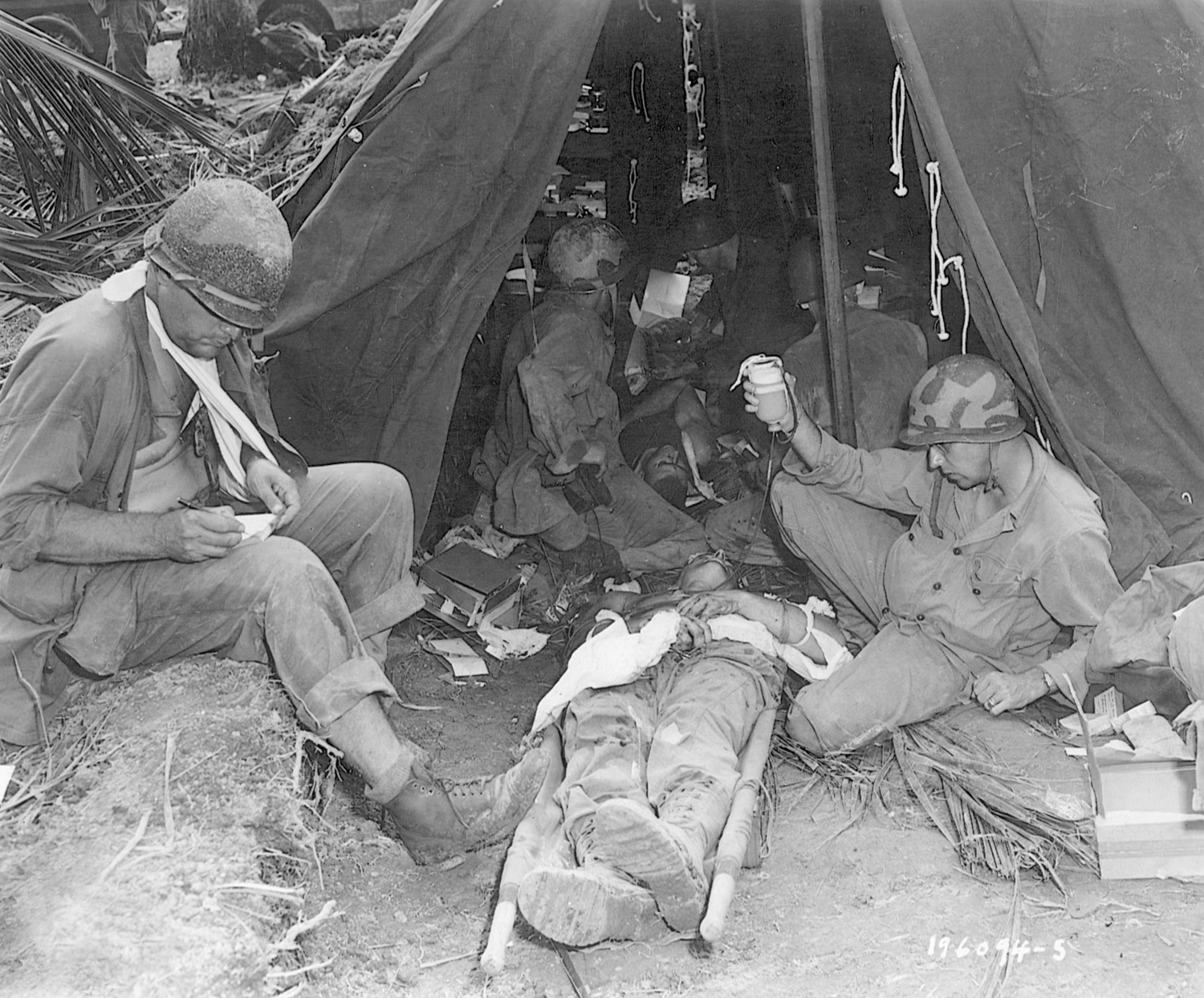 A wounded U.S. soldier receives lifesaving plasma from medics on the island of Leyte in the Philippines.