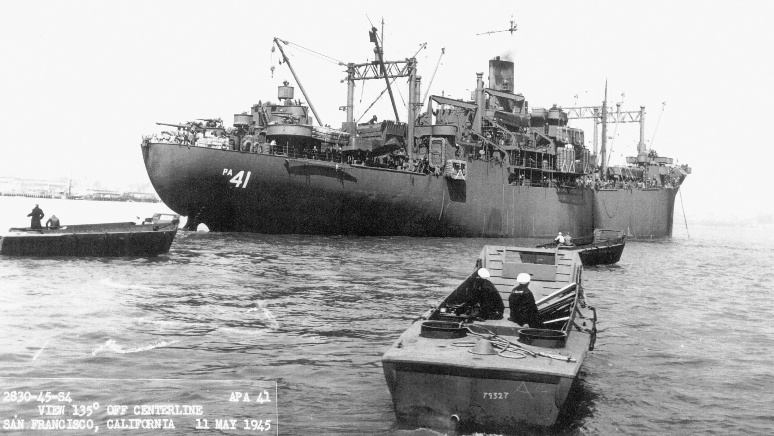 The attack transport USS DuPage rides at anchor in San Francisco Bay on May 11, 1945.