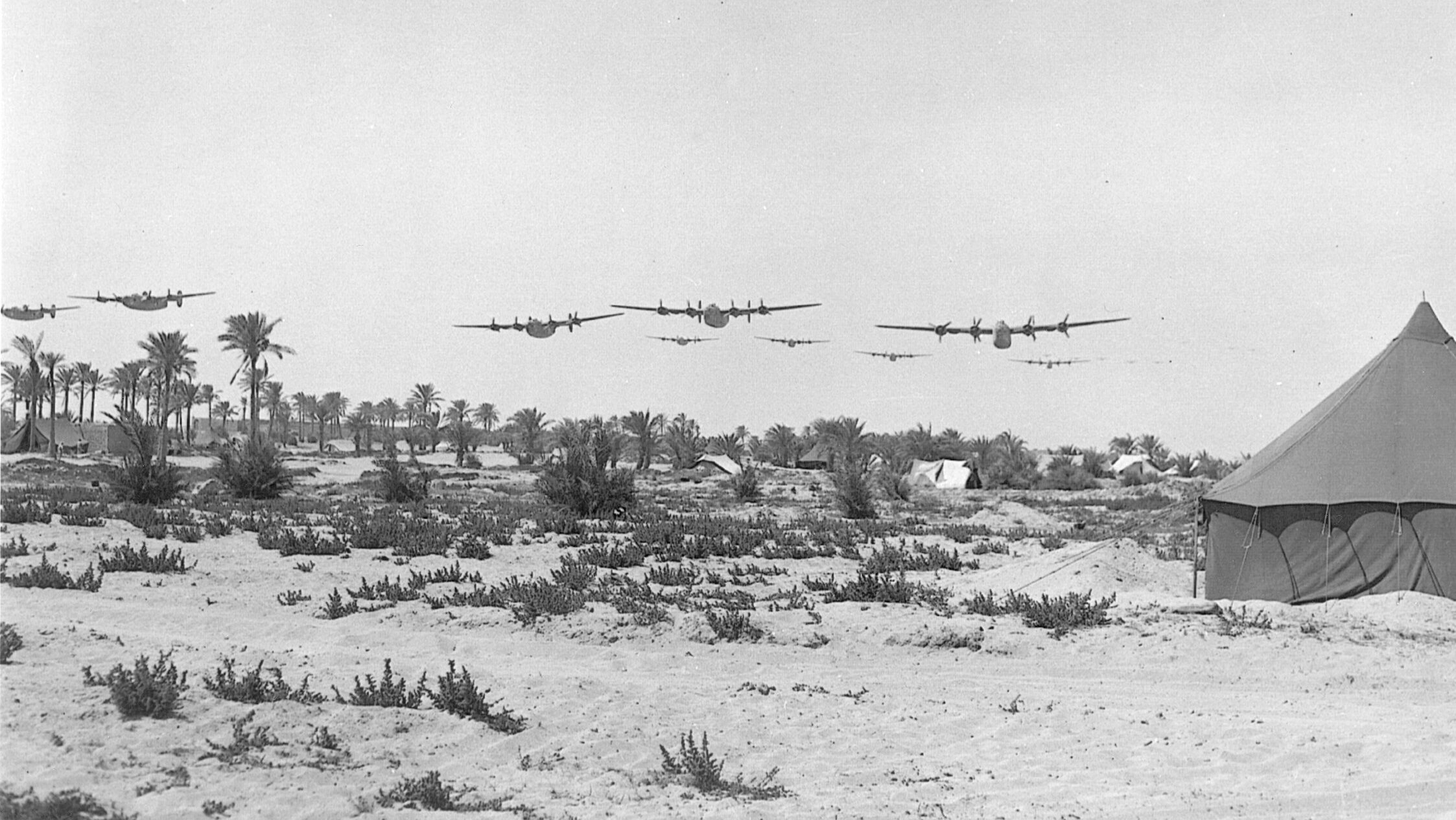 B-24s approach the safety of their North African bases after dropping a lethal cargo on the refineries of Ploesti, Romania.