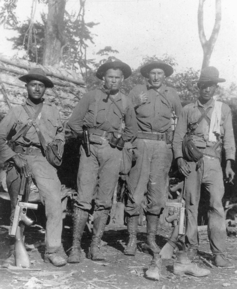 On duty in Nicaragua, Chesty Puller (second from left) poses with two comrades.