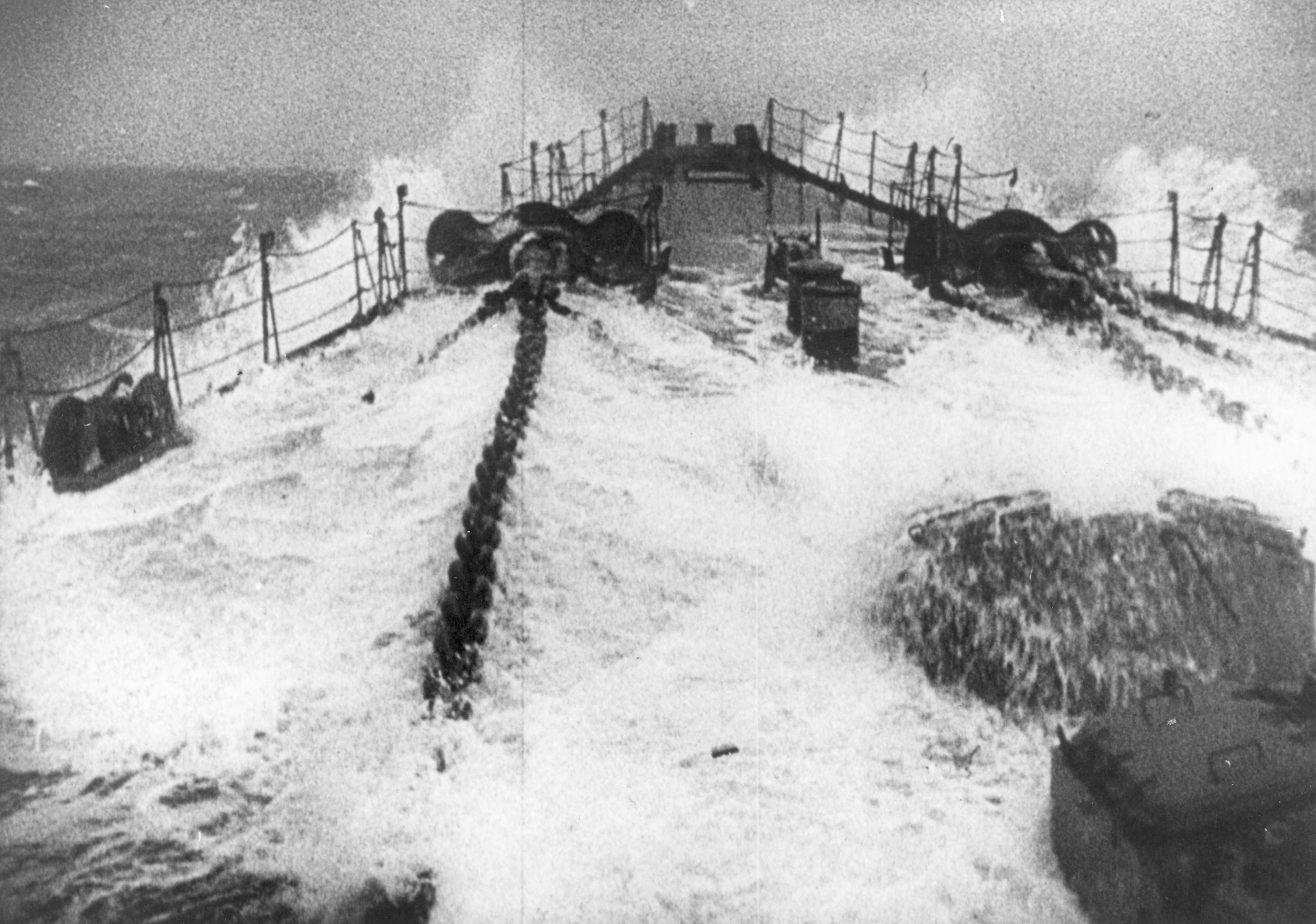 Water cascades across the bow of a German vessel in a still from a Nazi newsreel titled “Channel Dash.” Scharnhorst made the perilous journey to northern waters on February 12, 1942, in company with sister battlecruiser Gneisenau and cruiser Prinz Eugen. 