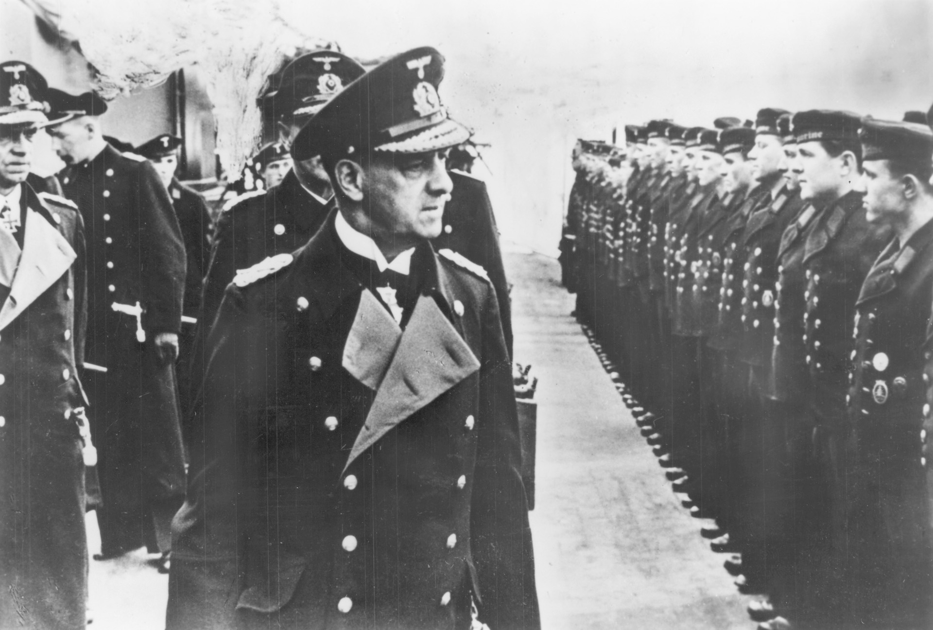 Grand Admiral Erich Raeder, supreme commander of the Kriegsmarine, reviews the crew of Scharnhorst and offers congratulations for the successful Channel Dash.
