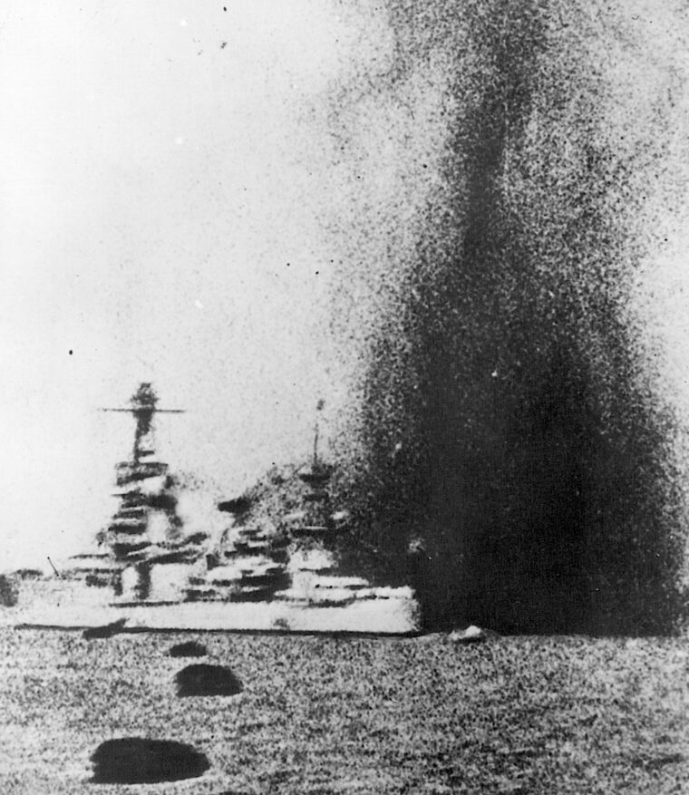 The explosions of errant Chinese ordnance shroud the cruiser USS Augusta. One U.S. sailor was killed and 18 wounded by a 1,300-pound bomb on August 14, 1937. 