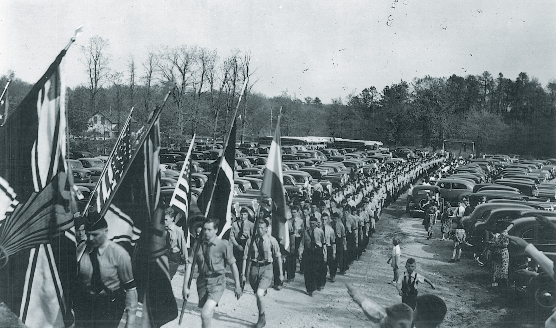 Young Hans Pogel (center) carries a flag during a procession to open Camp Siegfried in the summer of 1939. Numerous offshoots of the German-American Bund sponsored camps for the indoctrination of young people.