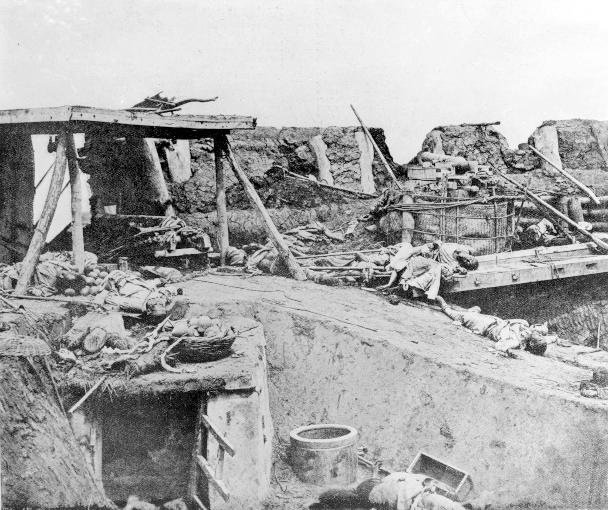 The scene inside one of the forts after the battle and before Chinese corpses had been removed. The fighting had been hand-to-hand. 