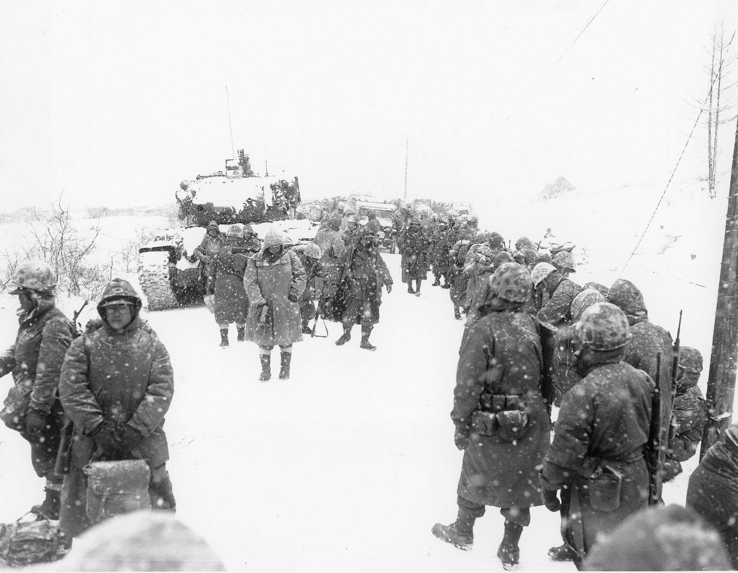 Marines of the 1st Division break camp at Koto-ri for the fight south toward Hungnam.