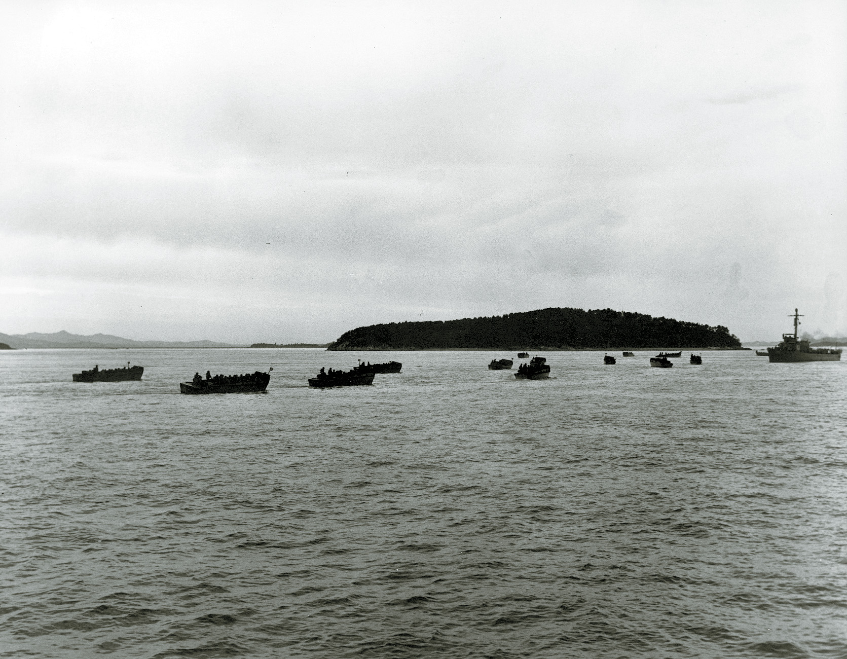 Marines move toward the beach in the first wave attack at Inchon. In order to get this far, the U. S. fleet had to dodge a typhoon and navigate the treacherous Flying Fish Channel.