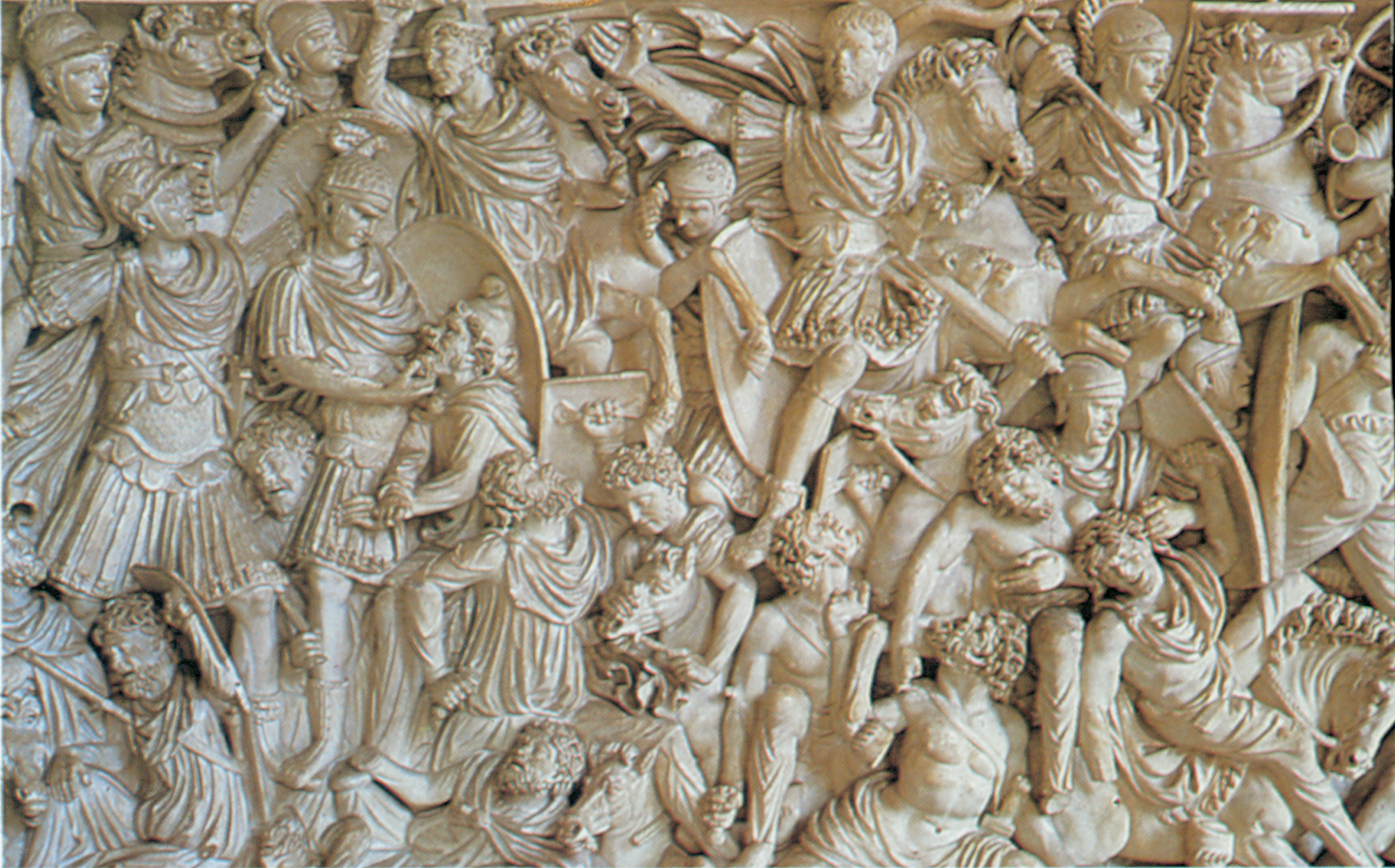 A complex sculpture vividly presents Roman infantry doing battle with barbarians.