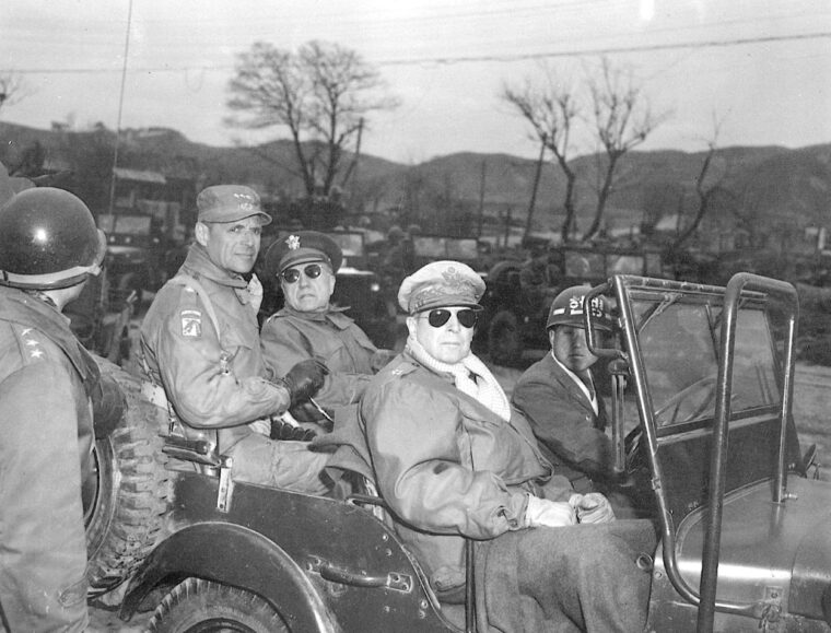 Douglas MacArthur with Matthew Ridgway on a tour of the front lines in Korea in 1951.