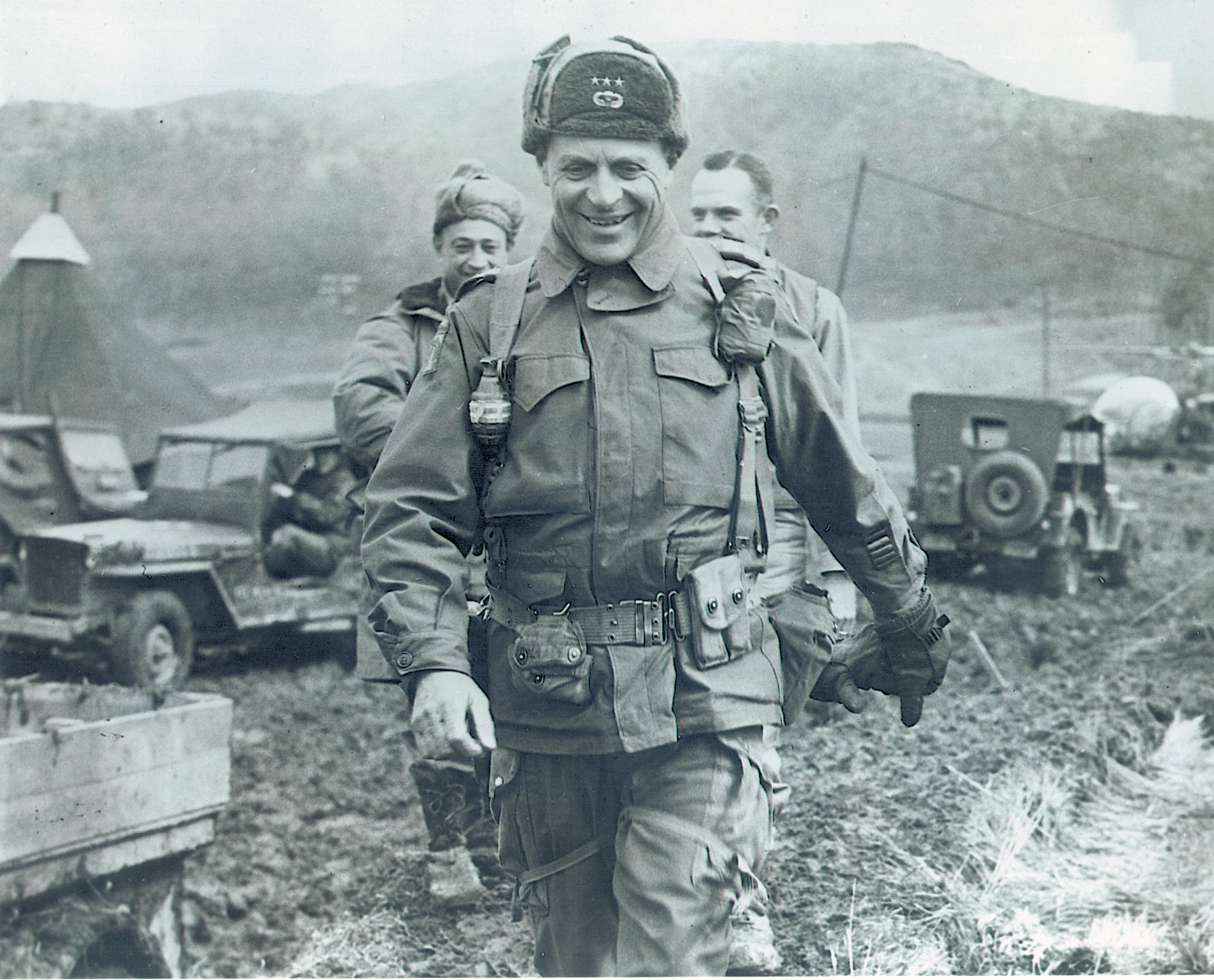 Lt. Gen. Matthew Ridgway visiting a Marine command post in the Wanju-Hoen sector of Korea in March 1951. His trademark grenade holds close to his shoulder. 