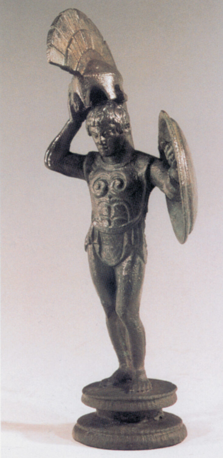 A warrior doffs his helmet, perhaps in relief after a hard struggle. The bronze figure was cast about the time of Xenophon’s march.