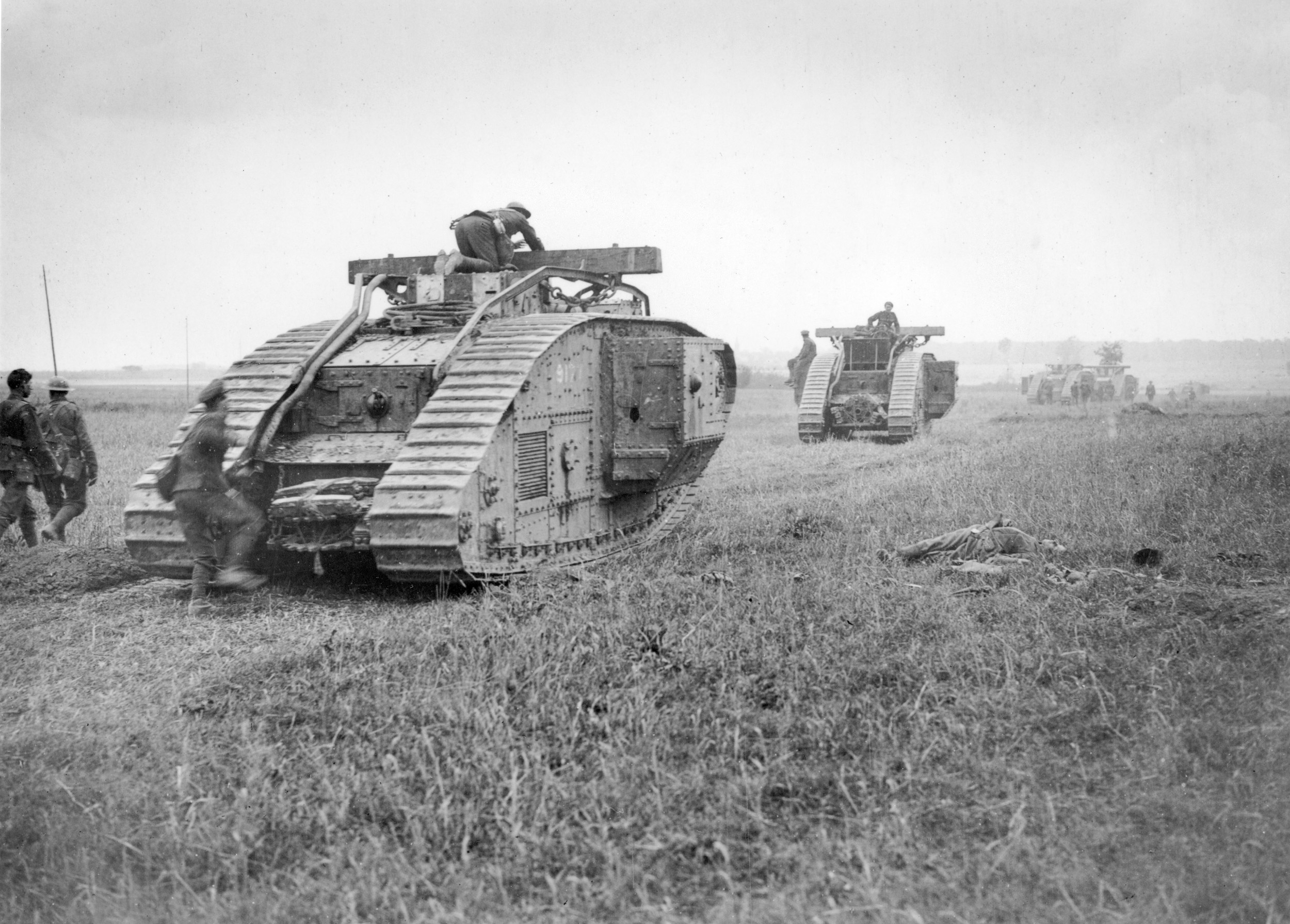 British Mark V tanks move forward on their way to the front. 