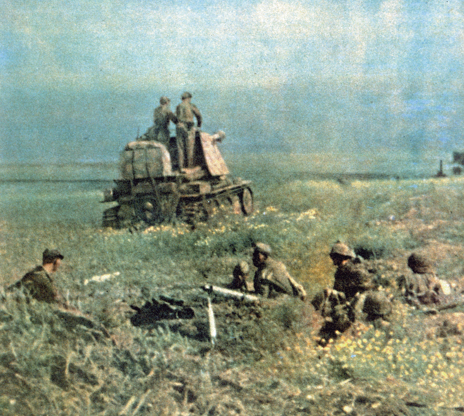 German artillery counterattacks near Belgorod after a breakthrough by Russian tanks. In the foreground are Waffen-SS troops with Red Army prisoners.
